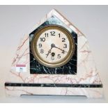 An Art Deco marble cased mantel clock of angular form having a painted dial with Arabic numerals,