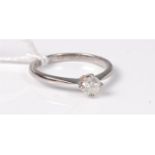 An 18ct white gold single stone diamond ring, he round brilliant cut diamond, estimated approx. 0.