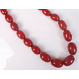 A faux 'cherry amber' bead necklace,