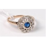 A 9ct blue and white hardstone cluster ring, with decorative heart shaped gallery,