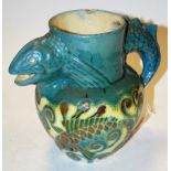 A Lauder Barum Devon Pottery jug, the body with incised fish decoration,