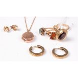 A quantity of mixed 9ct jewellery to include a garnet ring, earrings etc (11.