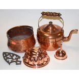 A 19th century copper range kettle, together with an early 20th century copper funnel,