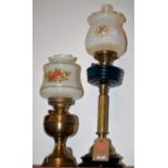 A Victorian pedestal oil lamp having opalescent frilled glass shade,