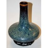 An early 20th century Ruskin style high fired pottery vase,