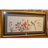 A modern Chinese framed silkwork, depicting exotic bird on flowering bamboo,