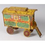 An early 20th century W R Jacobs & Co Ltd biscuit tin in the form of a travelling gypsy caravan,