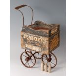 A circa 1930 Triang Brothers Wall's three-wheel ice cream cart,