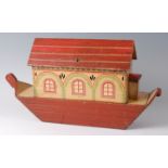 An early 20th century painted pine wooden Noah's Ark, comprising orange,