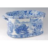 An early 19th century Don Pottery blue and white printed foot-bath, decorated with 'Views of Italy',