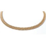 An 18ct collarette, the plaited rope style necklace with concealed box clasp and safety catch,