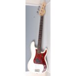 A 1963 Fender Precision bass guitar in white, serial No.