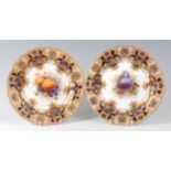 A pair of Royal Worcester porcelain cabinet plates, painted by Richard Seabright, signed,