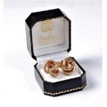 A pair of 9ct knot earrings,