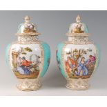 A pair of late 19th century Dresden porcelain vases and covers,