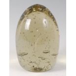 A large Victorian glass dump, of citrine colour, with bubble inclusions, hollowed out base,