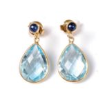 A pair of topaz and sapphire earrings, the pear shaped briolette topaz drops,