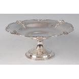 A George V silver pedestal comport, having shell cast rim, 10.