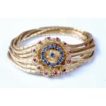 A mid 20th century 18ct Italian ruby and sapphire jarretière bracelet,