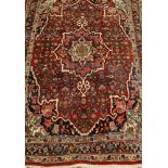 A Persian woollen Bidjar rug, the red ground with central medallion,
