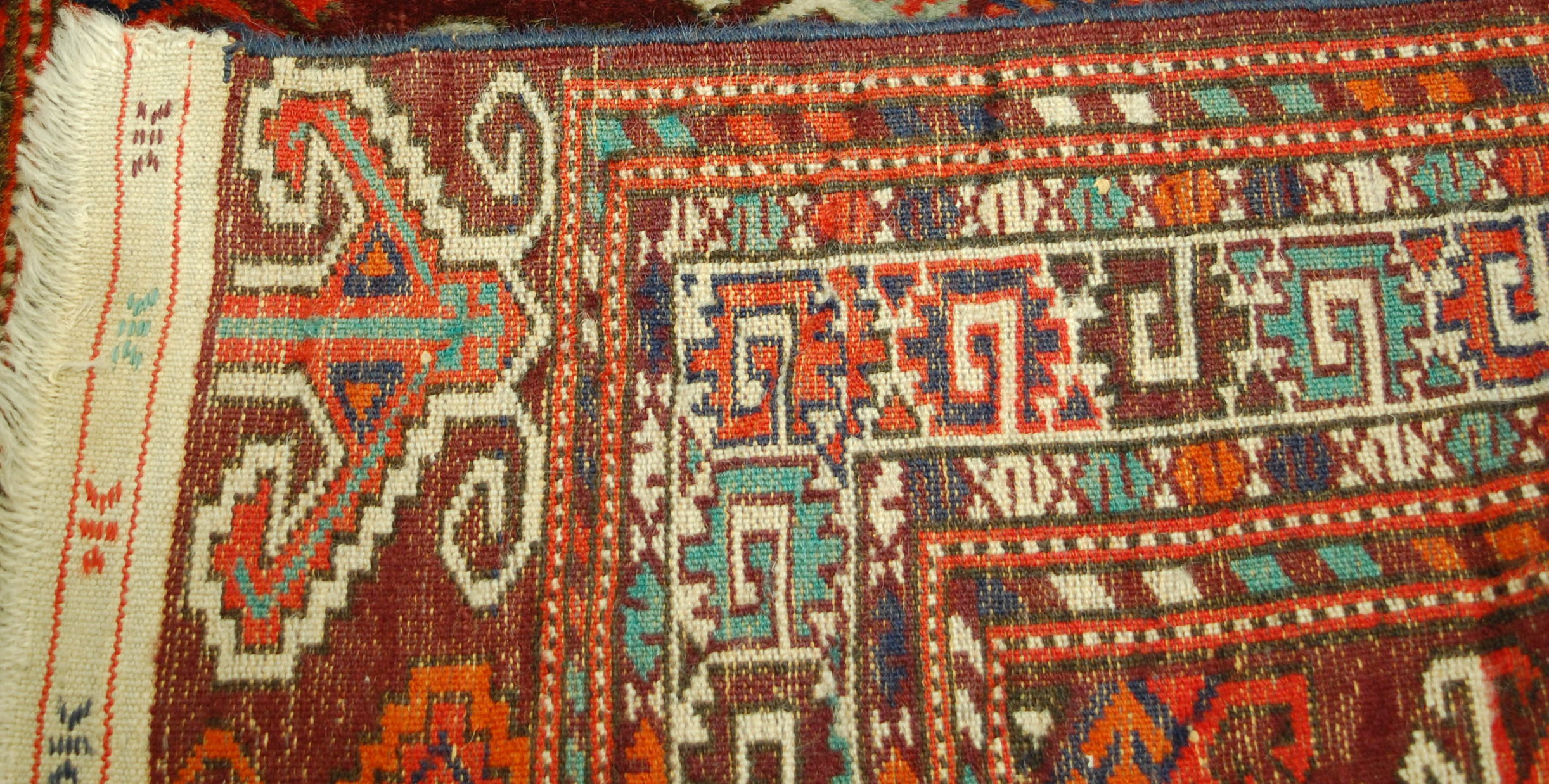 A Persian woollen Yomut rug, - Bild 2 aus 2