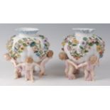 A pair of Ernst Bohne & Sohne porcelain vases, each of ribbed spherical form,