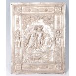 A Continental repousee decorated white metal plaque, depicting the legend of Sigurd & Brunhilde,