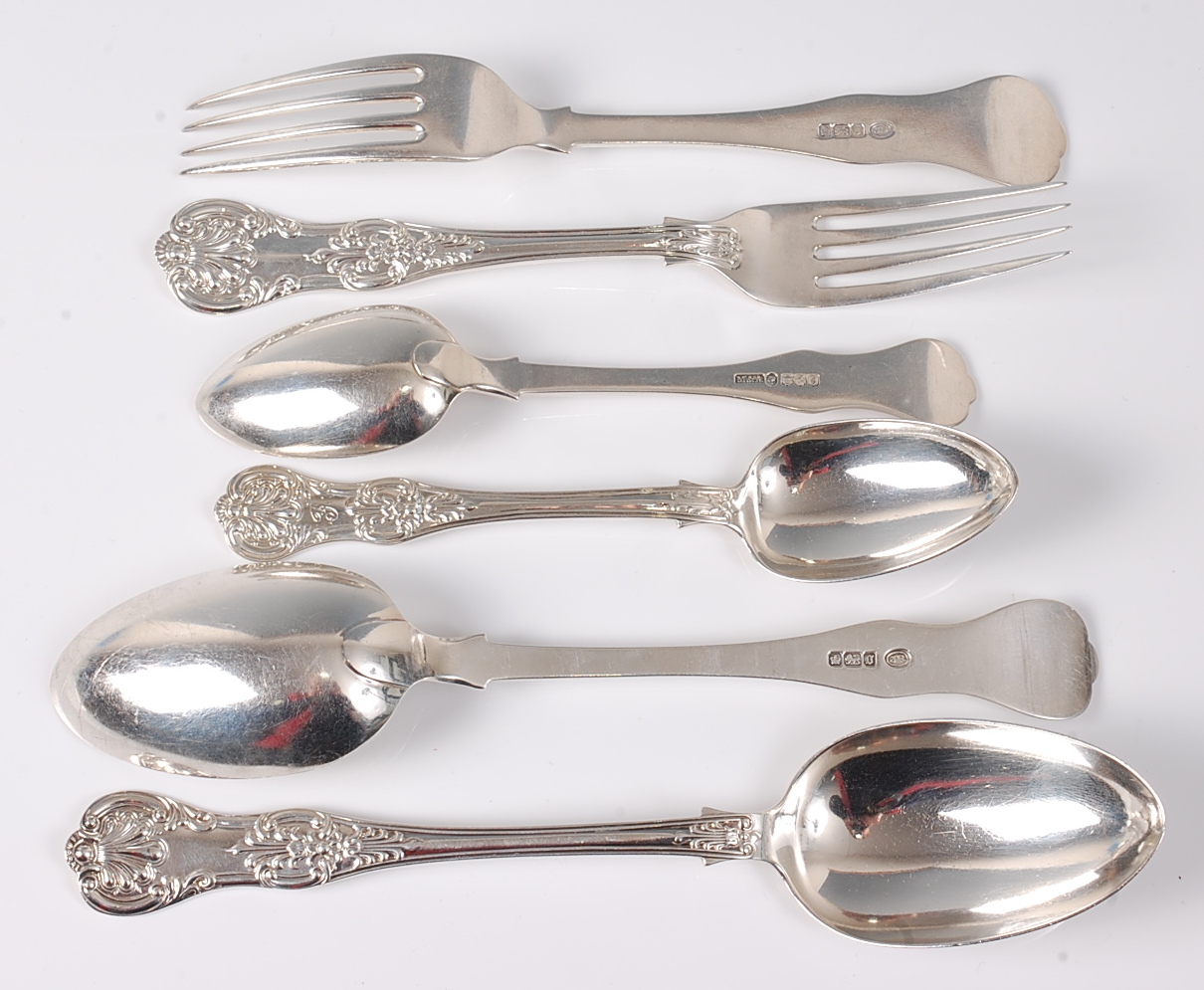 An extensive silver very-close harlequin cutlery suite, in the Kings pattern, each with plain backs,