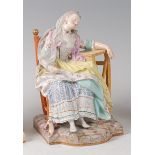 A late 19th century Meissen porcelain figure of a sleeping girl, sometimes called 'Sleeping Louise',
