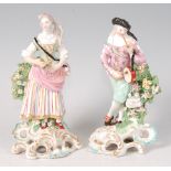 A pair of early 19th century English porcelain musician figures, as a male piper and his companion,