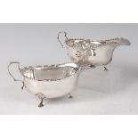 A cased pair of Edwardian silver sauceboats,