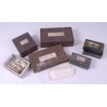 A quantity of specimen slides, the majority annotated and in fitted boxes,