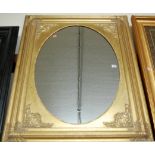 A modern gilt framed wall mirror,