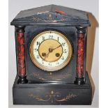 A circa 1900 black slate mantel clock, of architectural form,