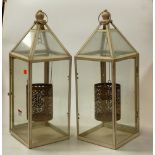 A pair of modern white painted and glazed outside hanging lanterns, h.