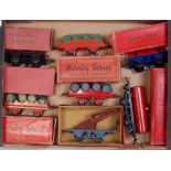 A large tray containing 7 boxed pre war Hornby wagons including 1933-9 gas cylinder with blue base