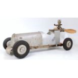 A scratch-built tether style racing car, fitted with miniature petrol engine,