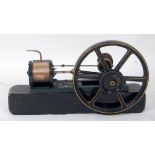 Horizontal steam engine comprising heavy wood plinth bearing single fixed cylinder of brass (2.