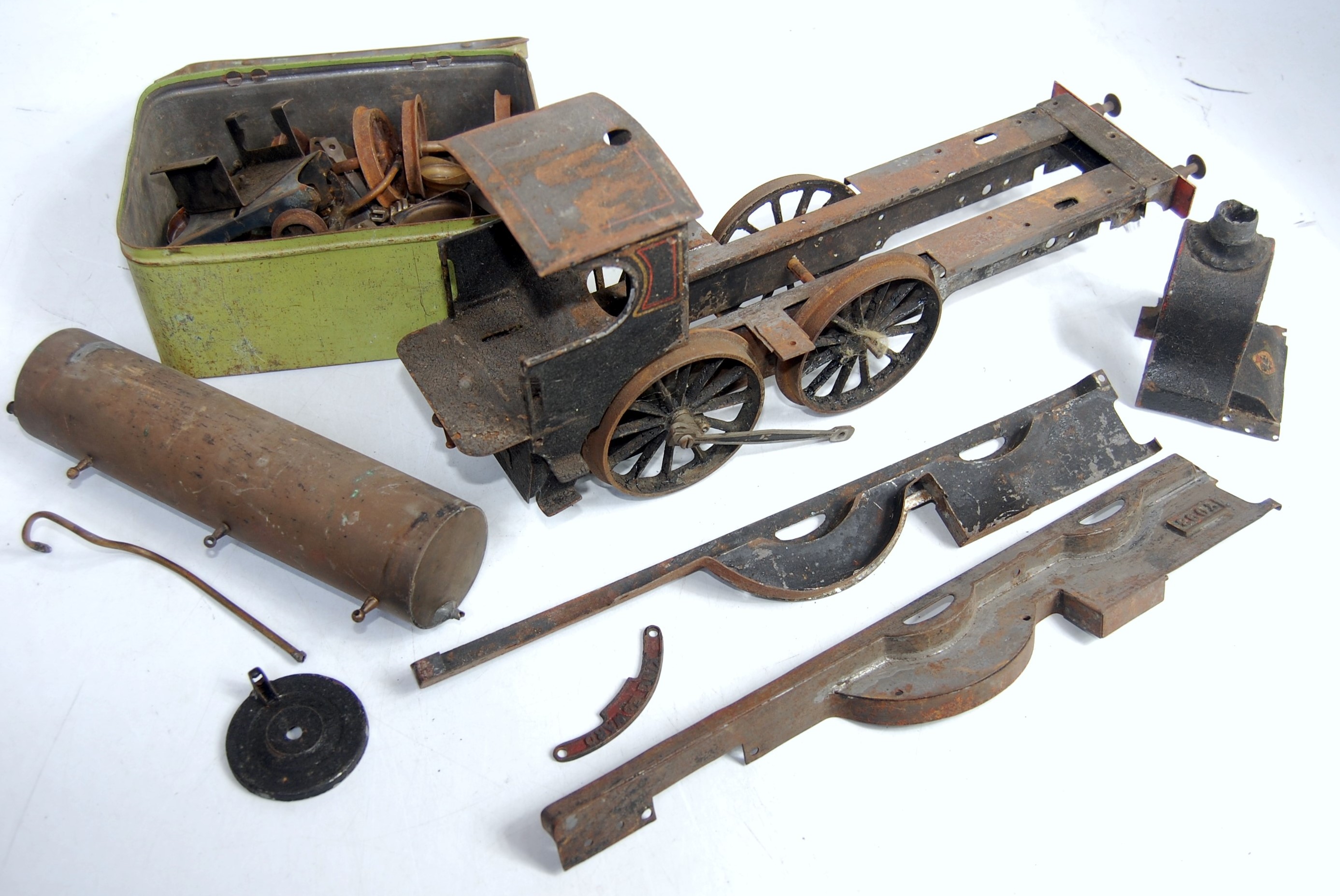 Components for a early 20th century 2.5 inch gauge tinplate 4-4-0 locomotive for restoration, No.