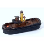 Early 20th century clockwork tug boat, hull hollowed out wood, prop shaft missing,