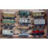 A large tray containing 12 pre war Hornby LMS assorted wagons including No.