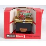 A Mamod Minor 1 steam engine comprising tin housed brass boiler with single oscillating engine,