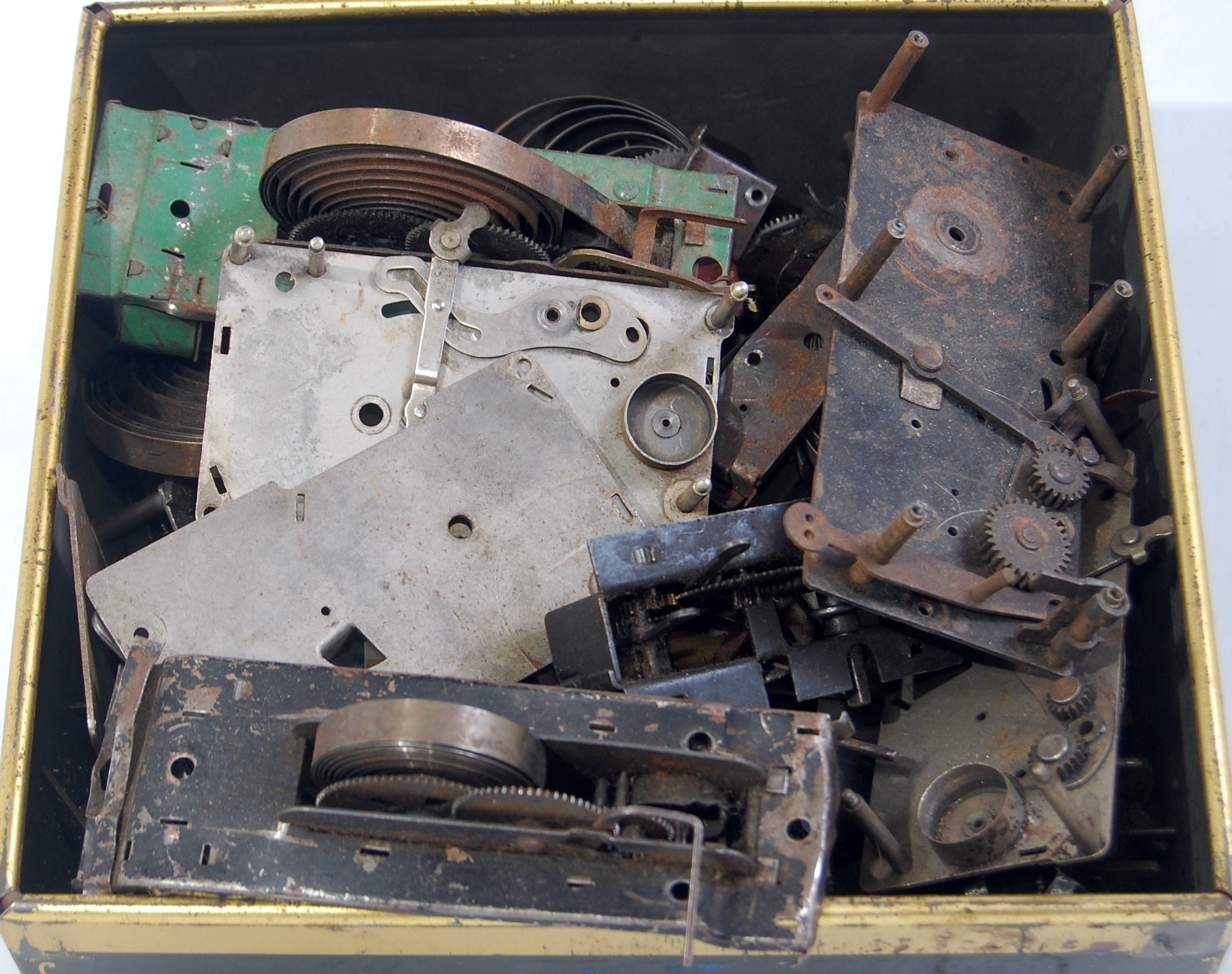 One box containing a quantity of various clock work and electric motor spares,