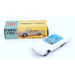 A Corgi Toys 215 Ford Thunderbird open sports car comprising white body with blue interior and spun