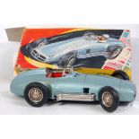 A JNF of Germany tinplate and friction drive model of a Mercedes racing car,