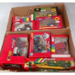 Eight various boxed Britains 1/32 scale farming implement and tractor diecast group,