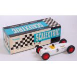 A Scalextric C96 1936 Auto Union Race Car comprising of white body with red plastic hubs and yellow