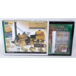 An Oc-Cre 1/24 scale wooden photo etched and white metal kit for a Stephenson's Rocket,