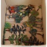 A collection of Britains and other trees, shrubbery, and garden flowers,