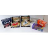 Seven various boxed plastic and diecast slot cars, to include Scalextric, Ninco, Cartrix,